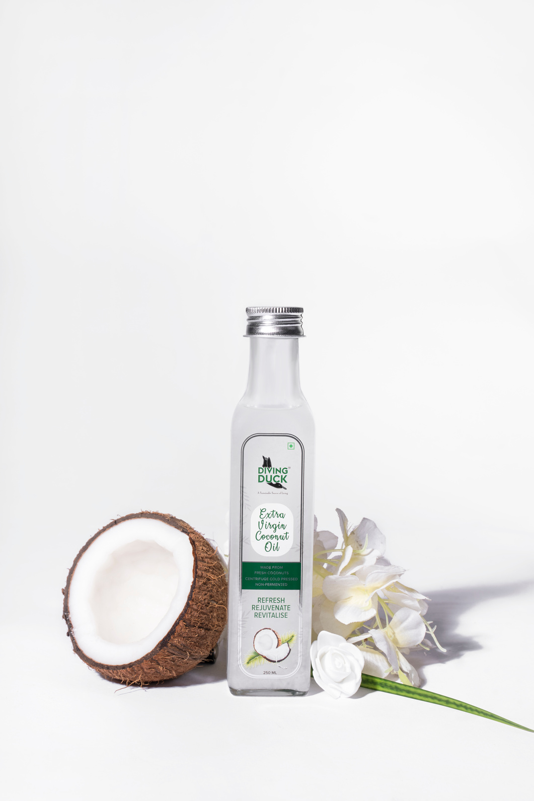 White and Green Labeled Bottle